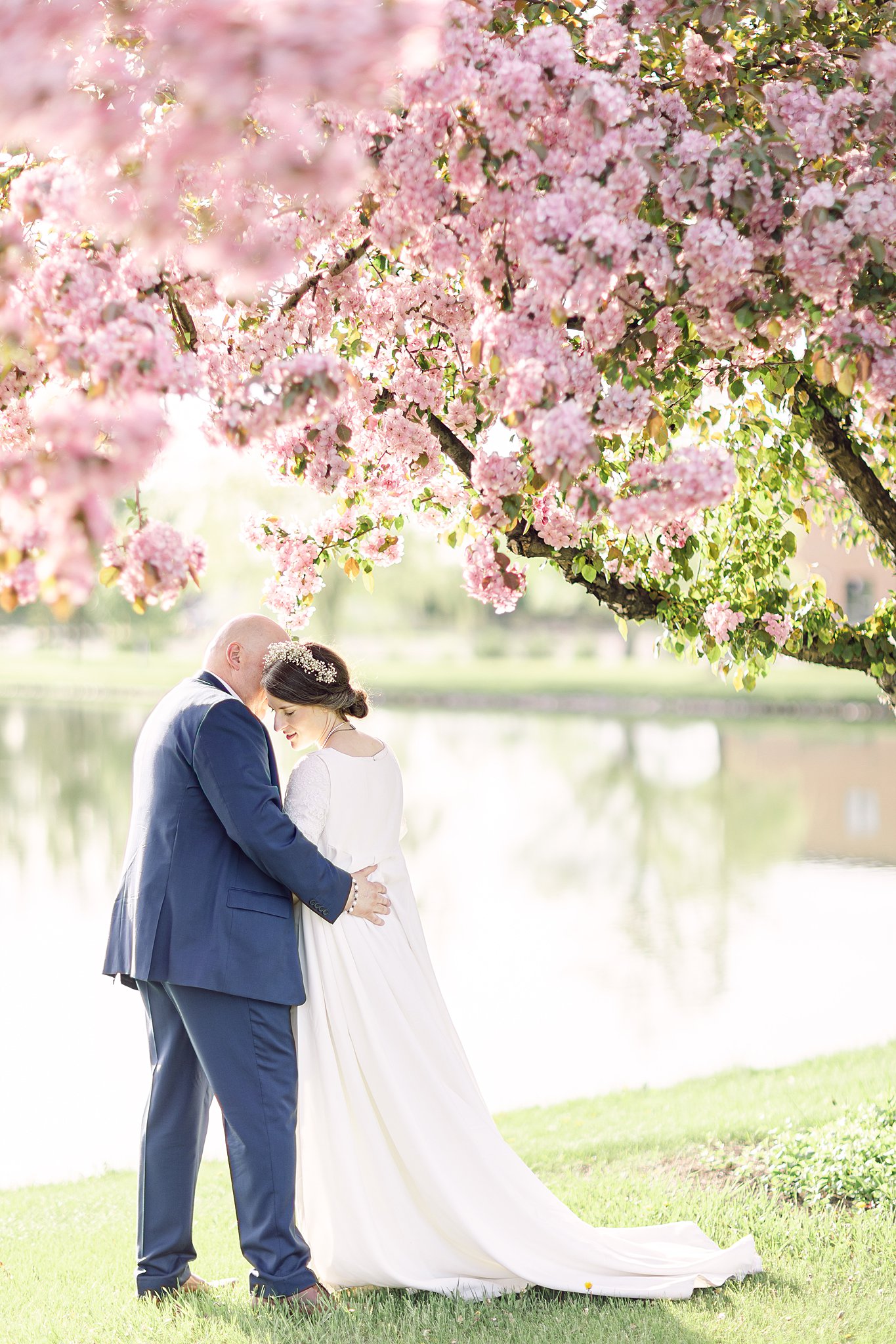 Apple Blossom Season Spring Wedding Portrait by Abby Anderson Wedding Photographer Fargo ND